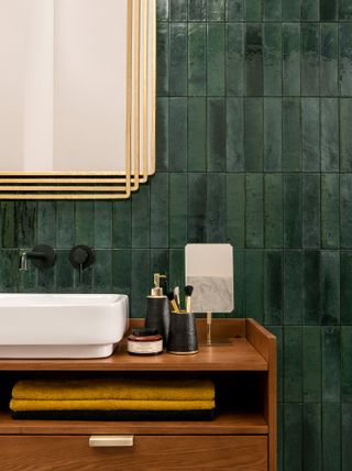 Bathroom tile ideas: deep green metro tiles stacked vertically