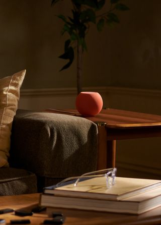 a red apple homepod mini