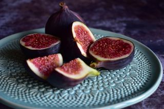 Close up of figs on decorative plate