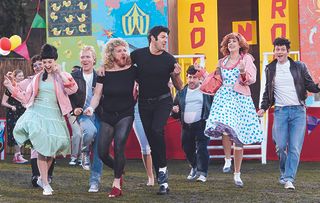 Keith Lemon and Paddy McGuinness dress up as Sandy and Danny to recreate the iconic show Grease in just half and hour