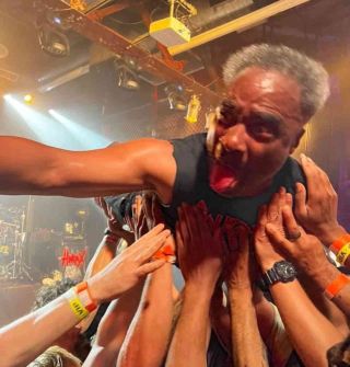 Kaon W De Pena of thrash metal band Hirax diving into a crowd