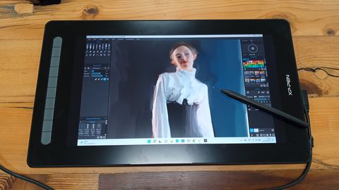 XP-Pen Artist 16 (2nd gen) review; represented by a photo of a drawing tablet on a wooden desk