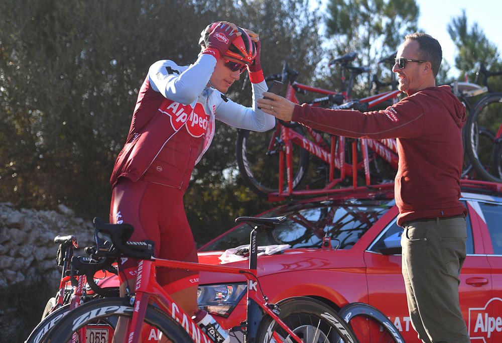 Marcel Kittel gets an assist from press officer Nier Falk