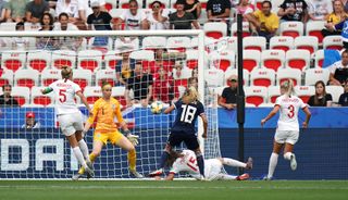 Claire Emslie, centre, scores Scotland’s goal against England