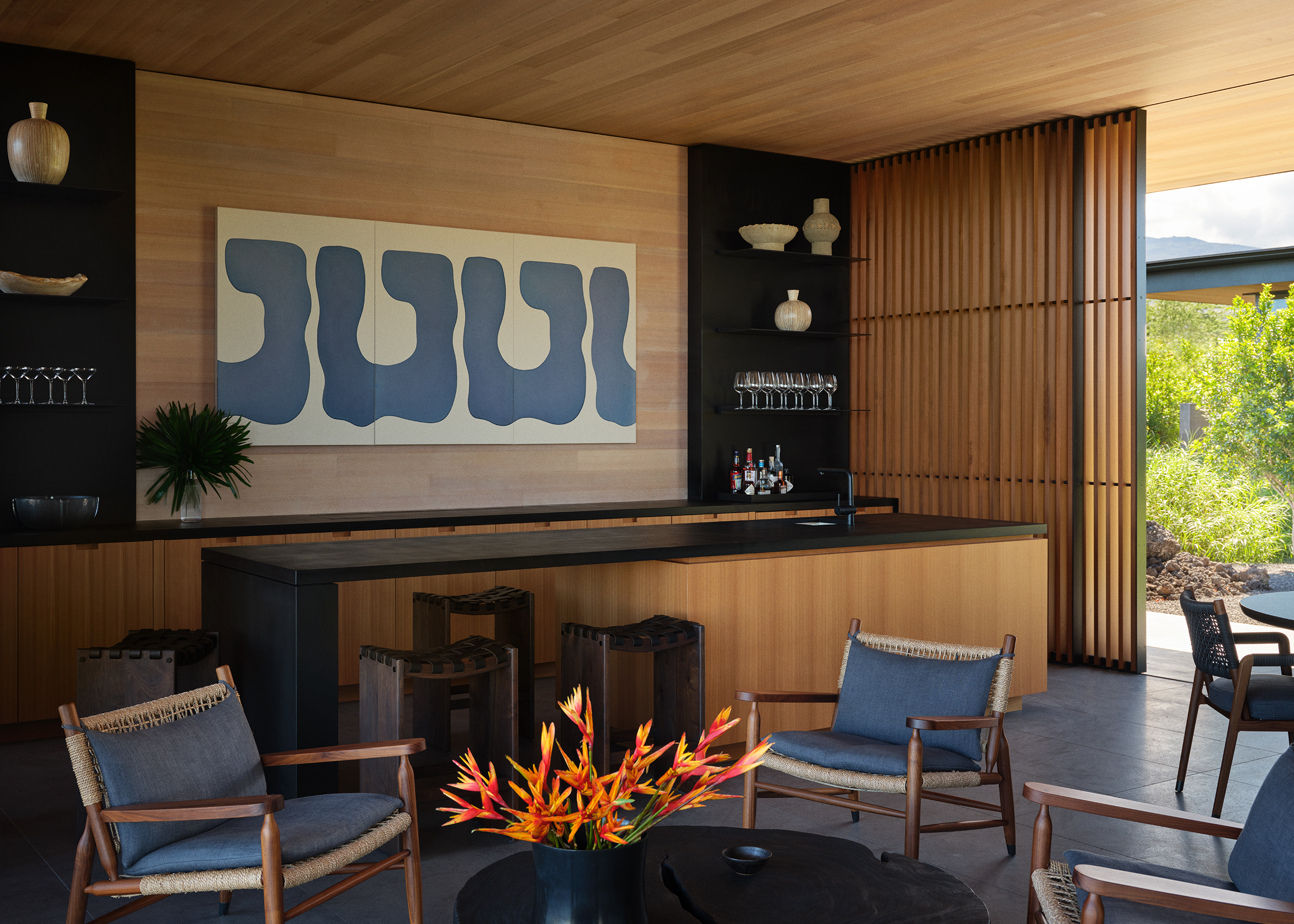 Hawaii house by oslon kundig and leverone design by the sea, tall ceilings, contemporary spaces and art work, and lots of glazing