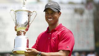 Tiger Woods with the US Open trophy after his 2008 win at the tournament