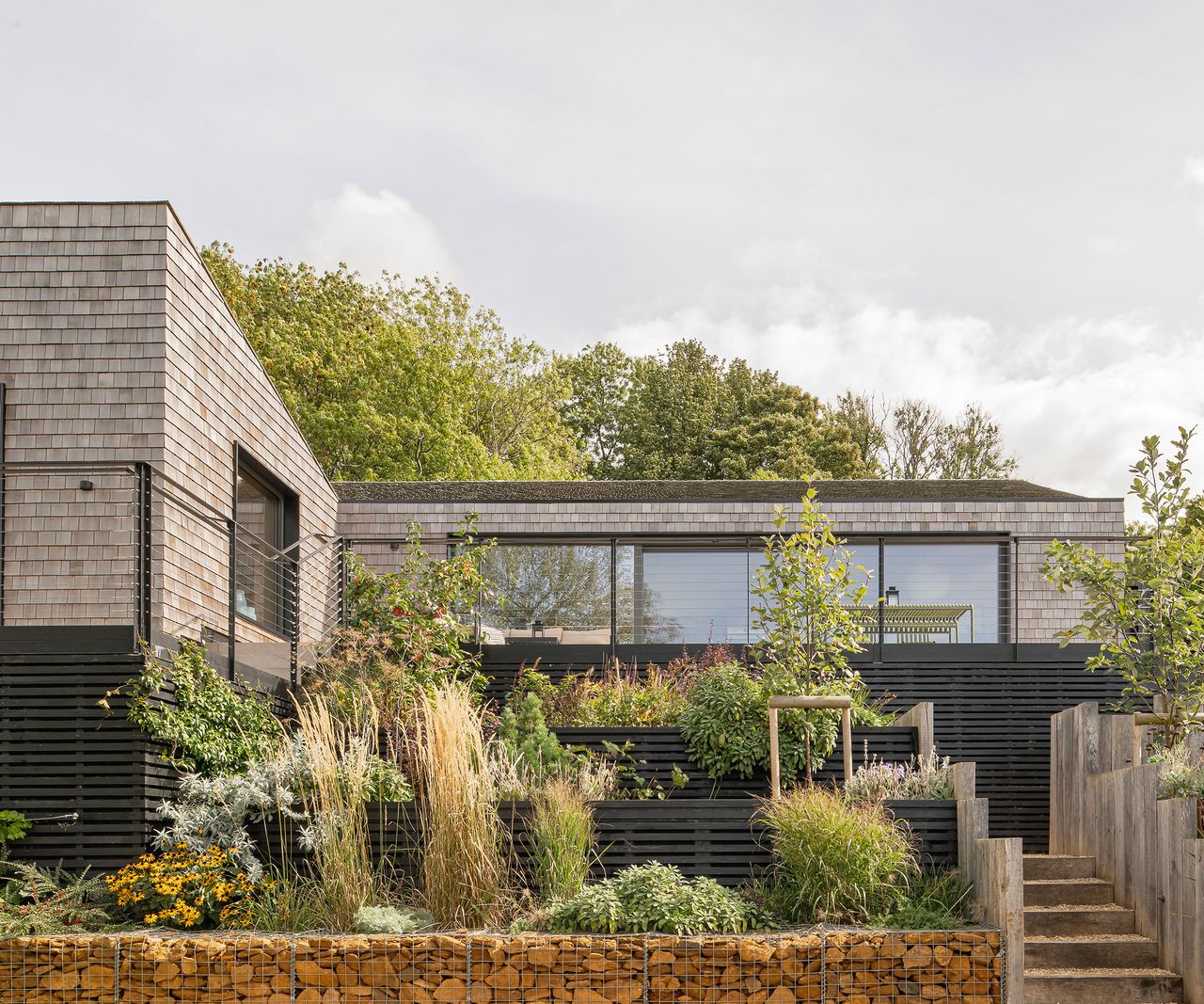 1970s renovated bungalow clad in cedar shingles