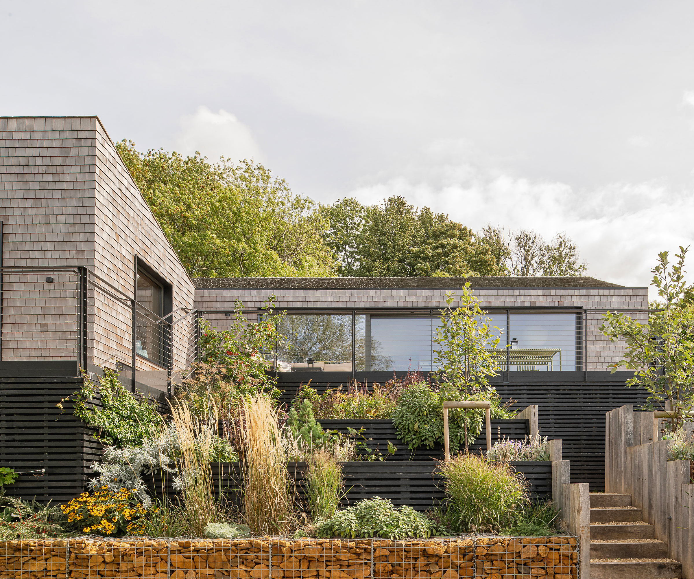1970s renovated bungalow clad in cedar shingles