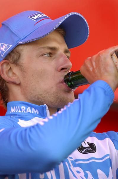 Gerald Ciolek (Milram) has a drink of Champagne after winning Vuelta a Espa&ntilde;a stage two.