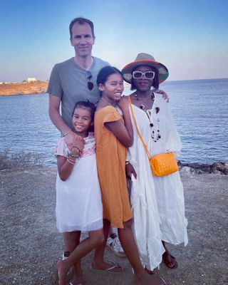 Aïda Moudachiro-Rébois with her husband and children