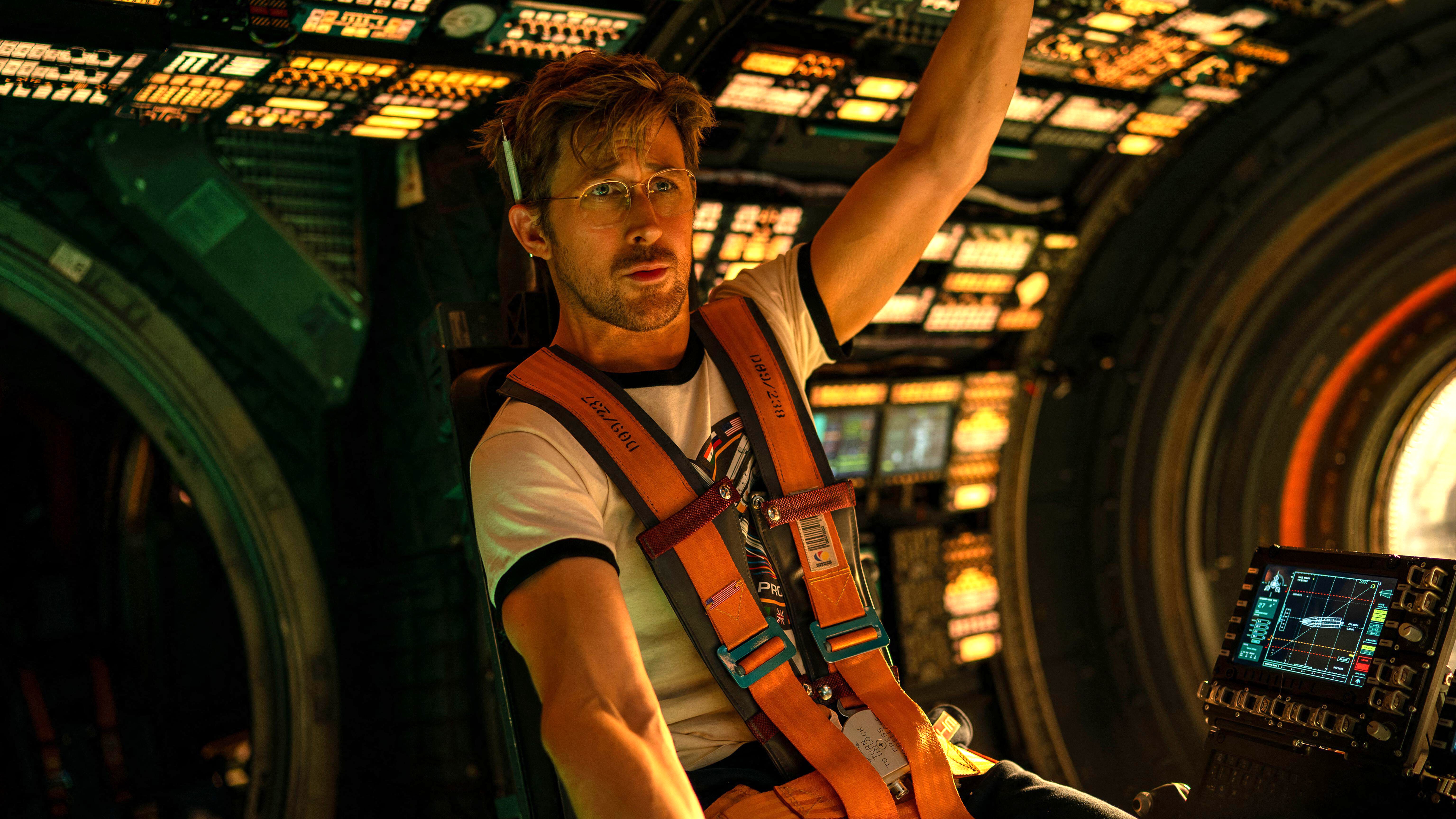 Ryland Grace (Ryan Gosling) strapped into the pilot's chair of his spaceship in "Project Hail Mary"