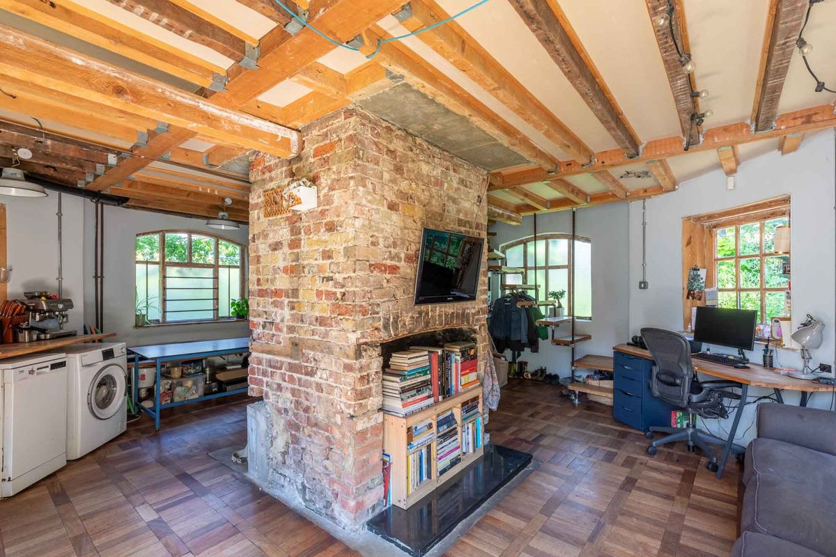 Wooden beams for the roof in the open plan living room kitchen