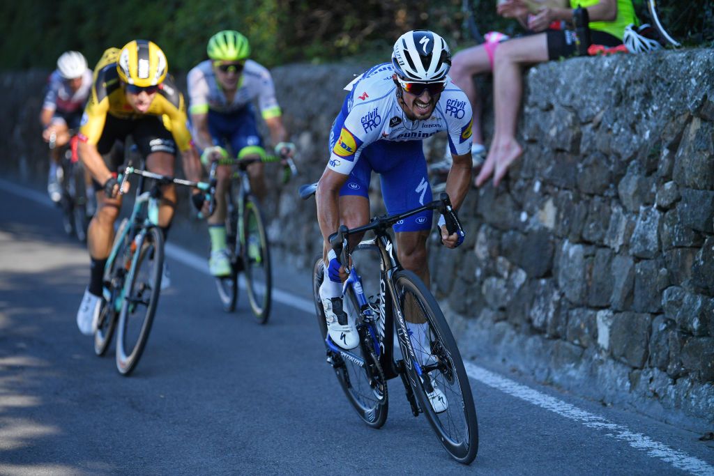 Van Aert is quick to respond but can't match the pace