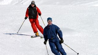 Prince William and Prince Charles ski on the Swiss Alps