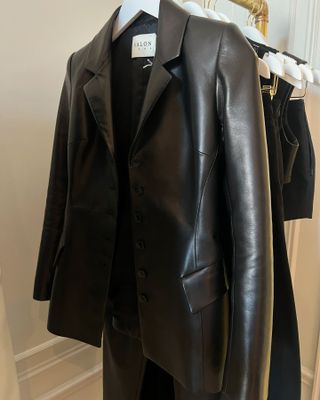 A photo of a Salon 1884 S/S 25 leather sculpted blazer.