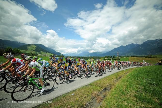 The peloton roll along during the opening stage at the Tour of Austria