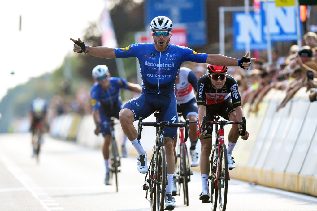 BOORTMEERBEEK BELGIUM SEPTEMBER 18 Florian Senechal of France and Team Deceuninck QuickStep celebrates at finish line as race winner ahead of Tosh Van Der Sande of Belgium and Team Lotto Soudal L during the 11th Primus Classic 2021 a 1977km race from Brakel to Boortmeerbeek Wespelaar Haacht primusclassic PrimusClassic on September 18 2021 in Boortmeerbeek Belgium Photo by Luc ClaessenGetty Images