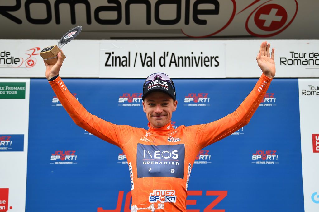 ZINAL VAL DANNIVIERS SWITZERLAND APRIL 30 Ethan Hayter of United Kingdom and Team INEOS Grenadiers Orange Points Jersey celebrates at podium during the 75th Tour De Romandie 2022 Stage 4 a 1801km stage from Aigle to Zinal Val dAnniviers 1664m TDR2022 on April 30 2022 in Zinal Val dAnniviers Switzerland Photo by Dario BelingheriGetty Images