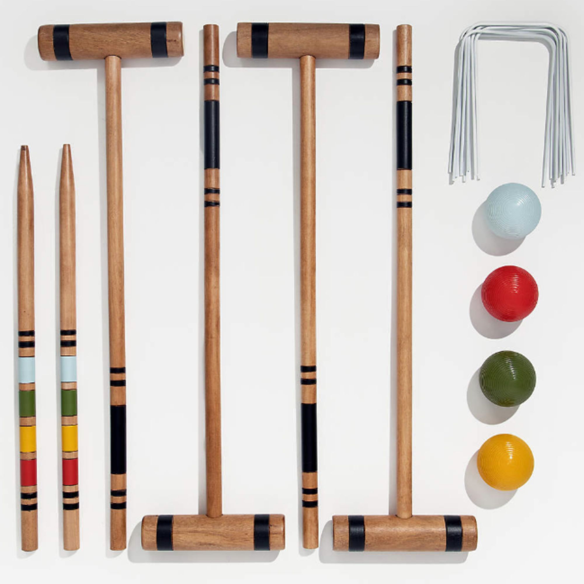 Oak croquet set with blue, red, green and yellow balls and metal wickets