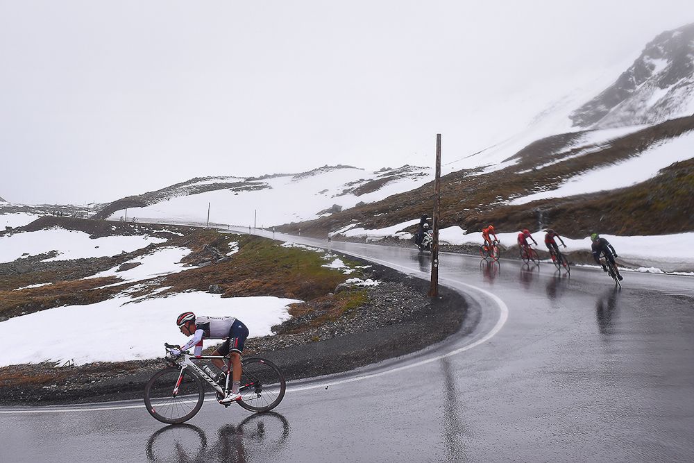 Jarlinson Pantano attacks on the slippery descent of stage 9 at the Tour de Suisse