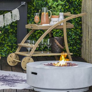 bar area with bar trolley and fire pit