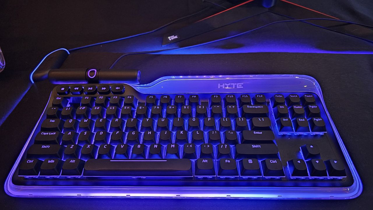 Hyte's Keeb TKL keyboard, synchronized with their Nexus Link software and RGB cooling on the CES 2024 show floor.