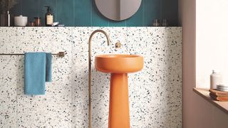 terrazzo tiles with orange basin
