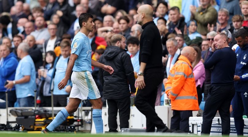 Rodri walks past Pep Guardiola following his red card in Manchester City&#039;s win over Nottingham Forest in September 2023.