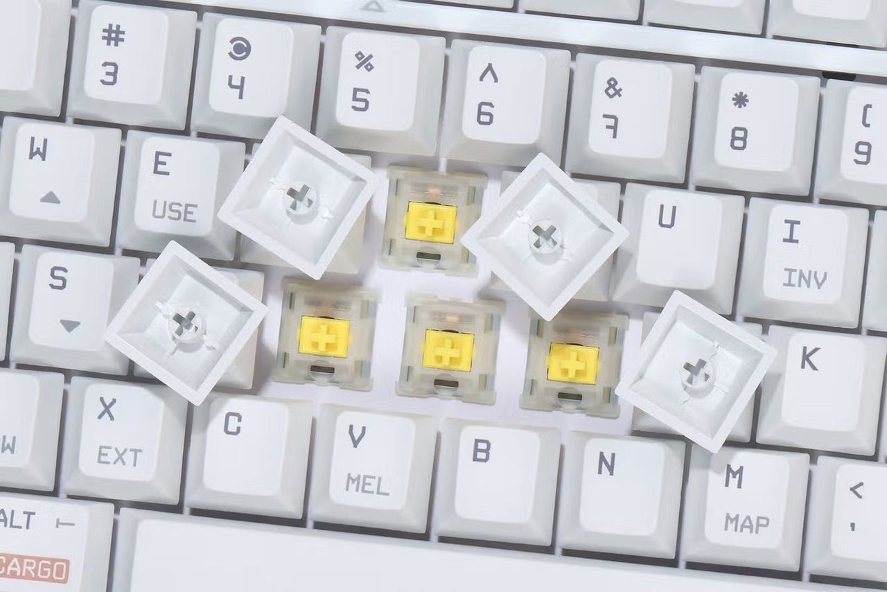 Shots of the keyboard, keys, cable, and deskmat included in the Drop x Starfield collab