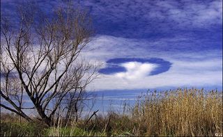 hole punch clouds