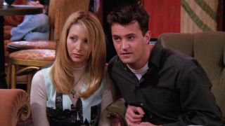 Phoebe and Chandler (Lisa Kudrow and Matthew Perry) in Friends on a couch together, Season 2, Episode 10 