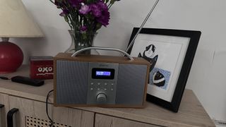 Groov-e Boston DAB radio on a wooden sideboard