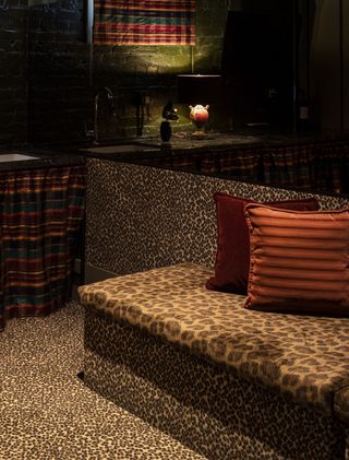 A room with a combination of leopard print and striped pattern