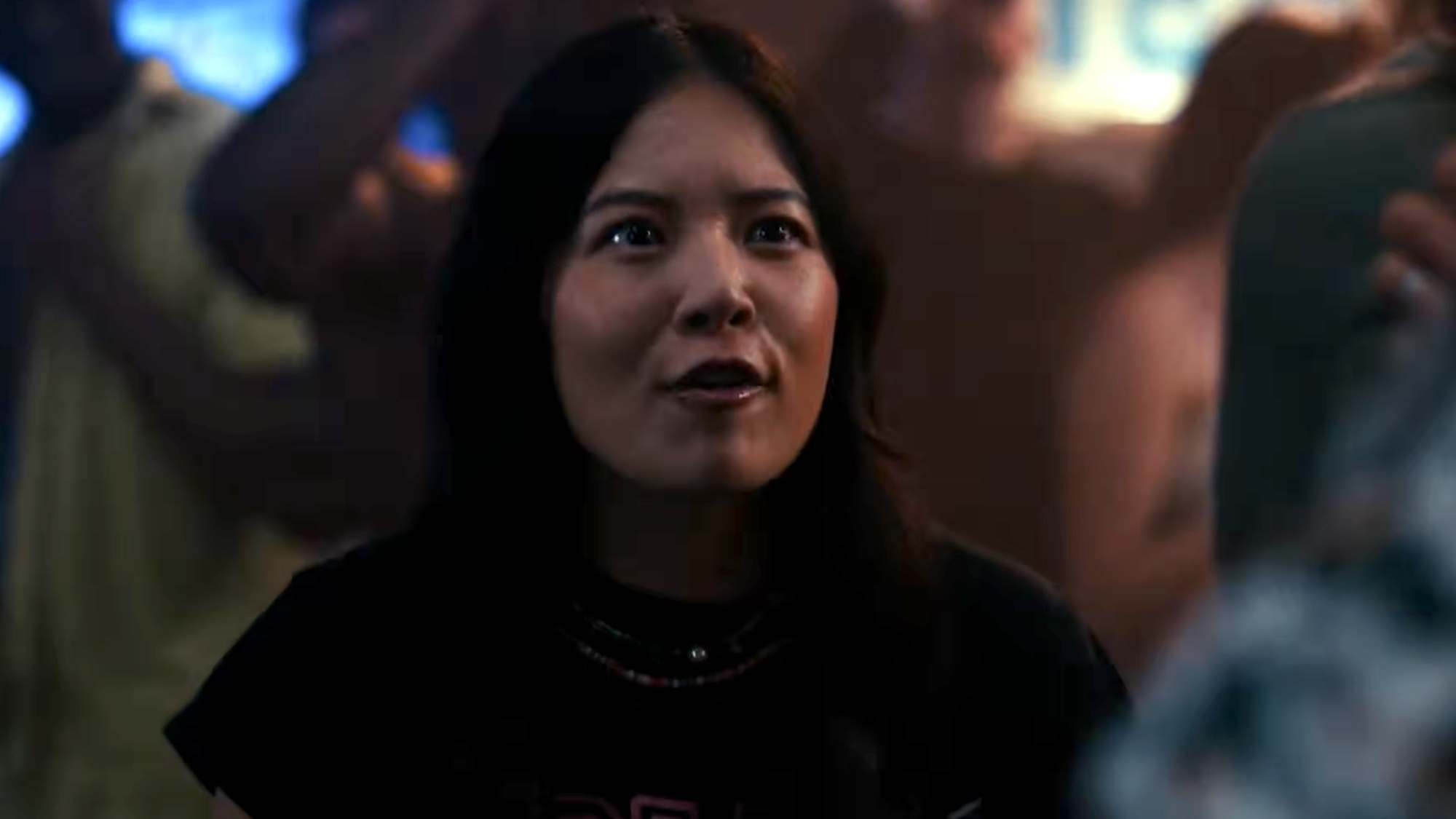 Linda (Christine Ko) hallucinates that Hank is on fire in Rolling Loud: The Movie.