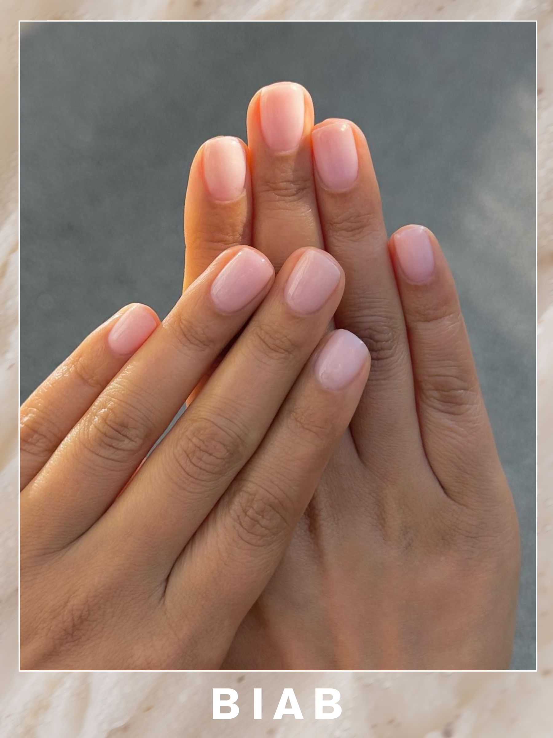 A pale pink BIAB manicure