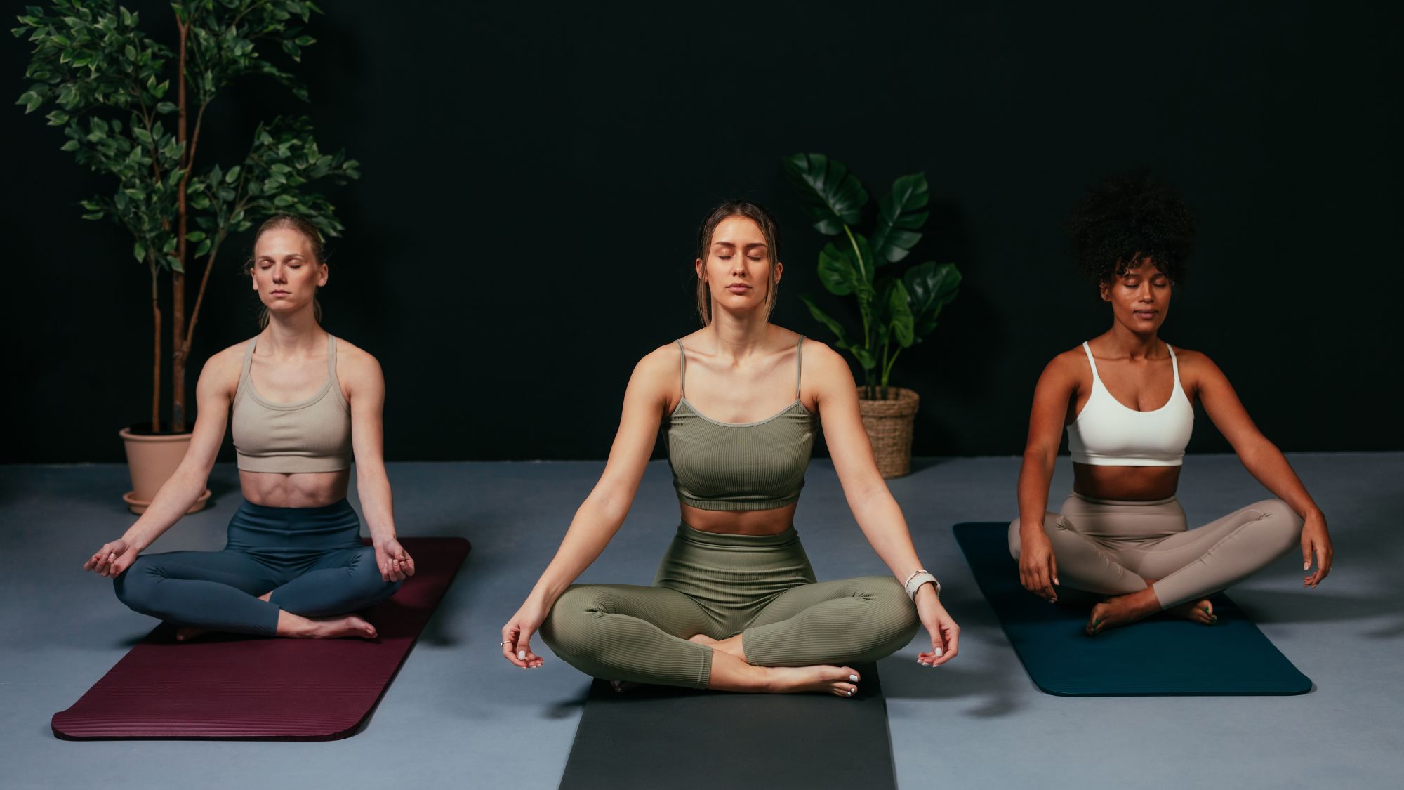 Three women doing one of the best yoga flows for flexibility