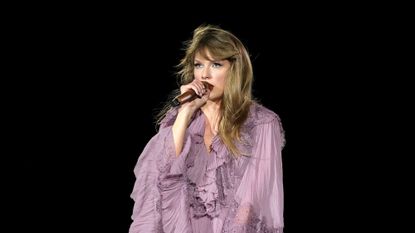 Taylor Swift performing on stage for her Eras tour