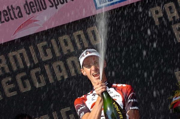 Bubbly time. Kurt-Asle Arvesen (Team CSC) celebrates.