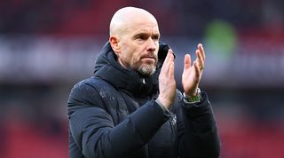 Manchester United boss Erik ten Hag applauds the fans after his side's loss to Fulham in February 2024.