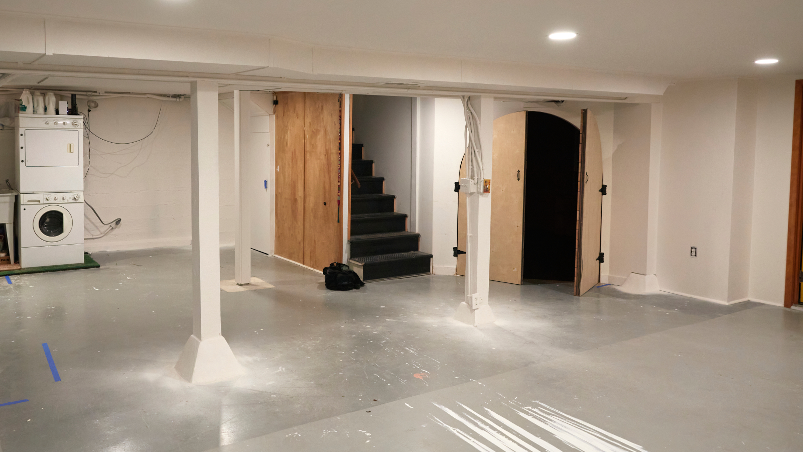 part finished basement conversion with internal door and laundry appliances