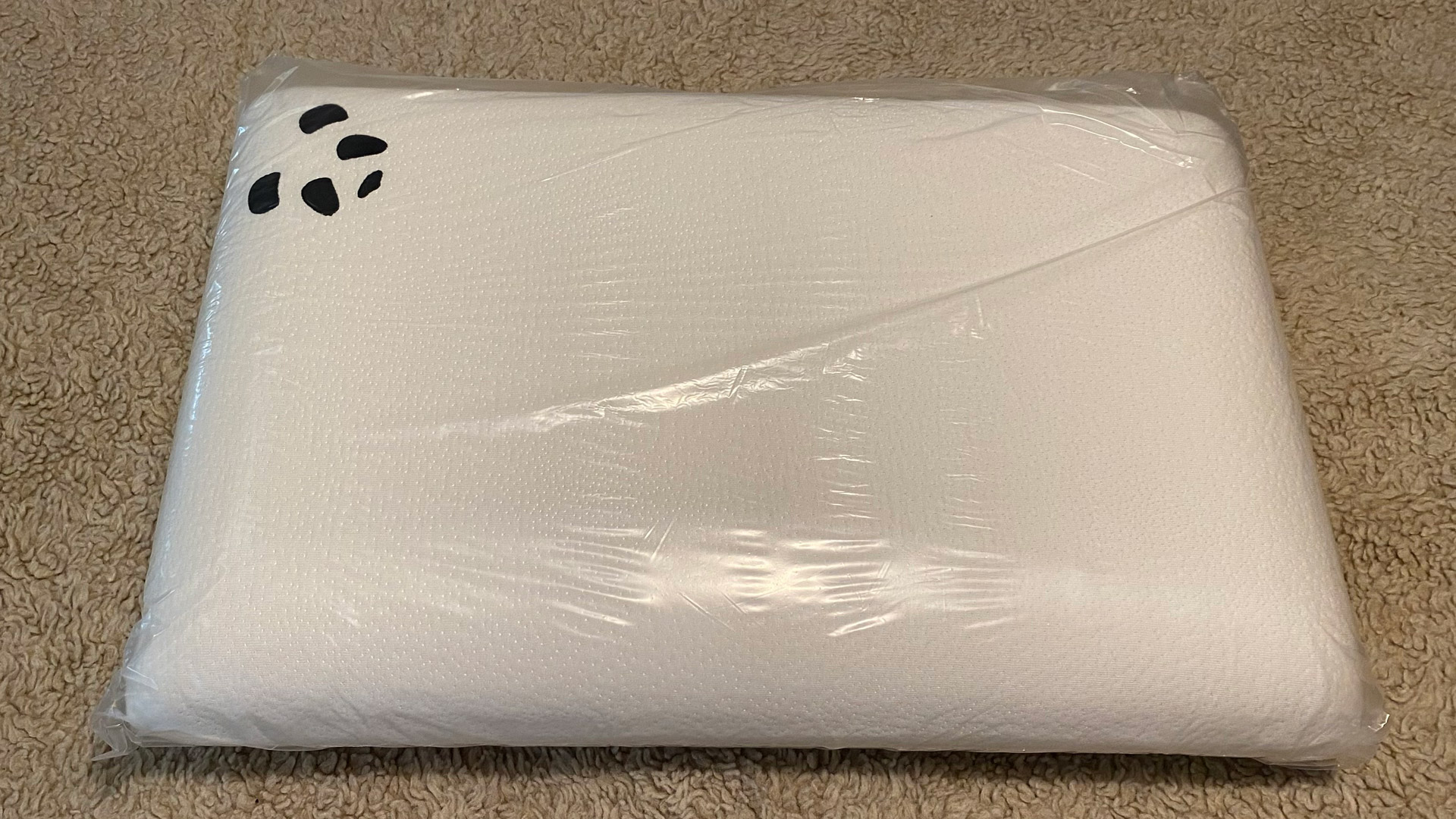 The Panda Memory Foam Bamboo Pillow in plastic wrap