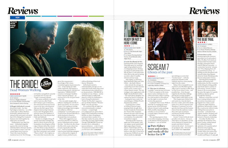 Two pages of film reviews.