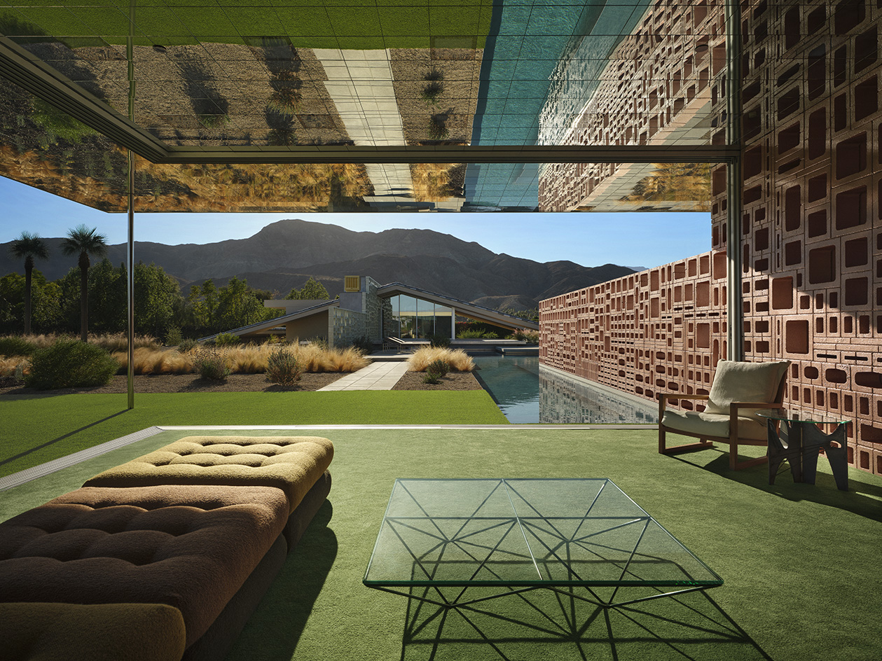 Desert house by Robert Stone, a home made with perforated partitions and an intense pitched low roof