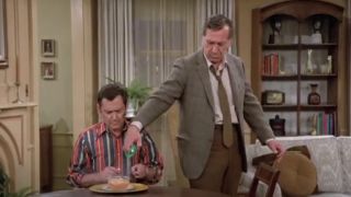 Tony Randall as Felix disappointed that Jack Klugman as Oscar has sprayed disinfectant in his food on The Odd Couple