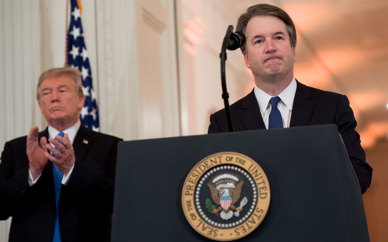 Judge Brett Kavanaugh speaks after being nominated by President Donald Trump (L) to the Supreme Court.