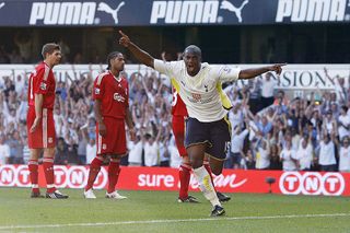 Tottenham Hotspur's French defender Sebastien Bassong (C) celebrates scoring the second goal during their Premier League football match against Liverpool at White Hart Lane, London, on August 16, 2009. AFP PHOTO/GLYN KIRK FOR EDITORIAL USE ONLY Additional licence required for any commercial/promotional use or use on TV or internet (except identical online version of newspaper) of Premier League/Football League photos. Tel DataCo +44 207 2981656. Do not alter/modify photo. (Photo credit should read GLYN KIRK/AFP via Getty Images) Newcastle