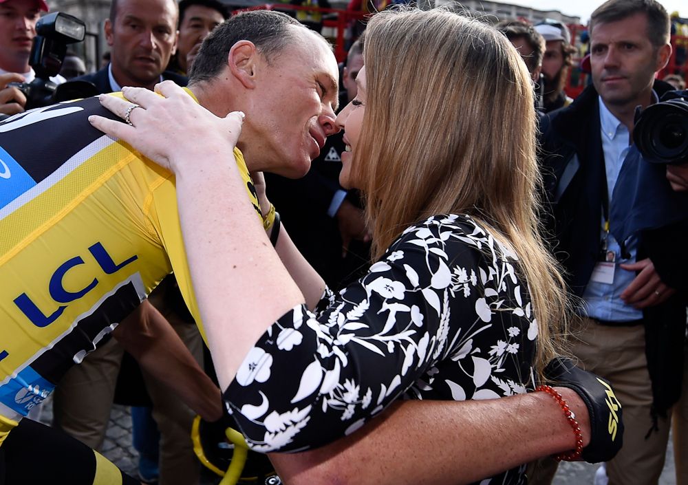 Chris Froome kisses his wife, Michelle, following the last stage of the 2015 Tour de France.