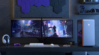 Alienware gaming setup with monitors, headset, gaming PC, keyboard, mouse
