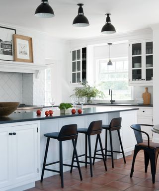Kitchen white units with black surfaces