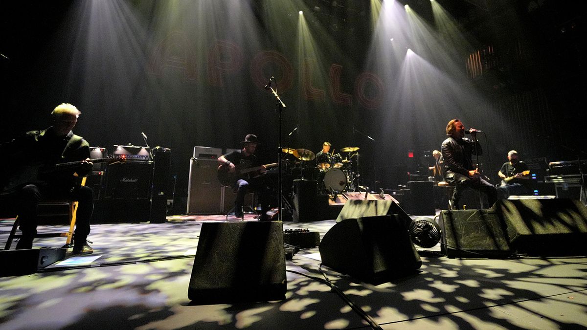 Pearl Jam play a seated number at the Apollo theater.